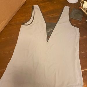 Express tank with cut out detail
